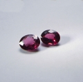 Bild 1 von 1.46 ct. Feines Paar rot - violette ovale 5.9 x 4.8 mm Rhodolith Granate