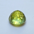 Bild 2 von 1.44 ct.  Feiner runder gelblich grüner 6.3 mm Titanit Sphen